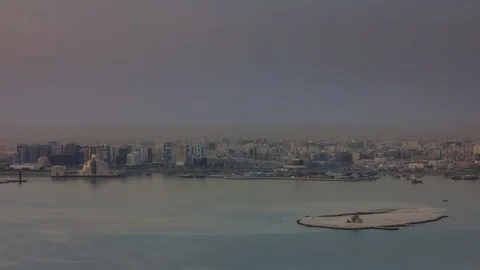 Sunset sky doha city rooftop downtown bay panorama 4k timelapse qatar Stock Footage 87959136
