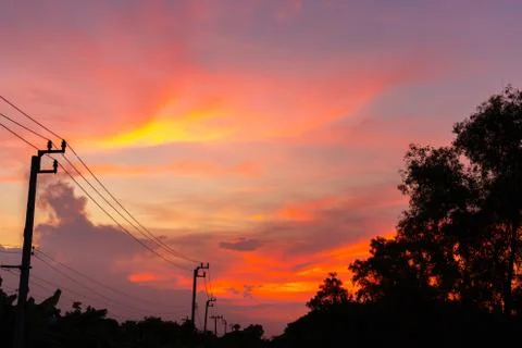 Sunset Sky with Dramatic Clouds and Colors in Twilight Evening 写真素材