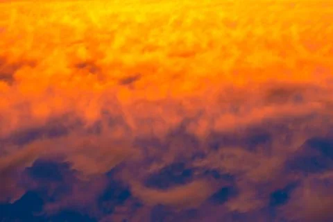 Sunset sky, dramatic clouds on colorful sky Stock Photos