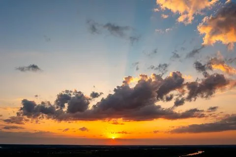 Sunset sky with dramatic clouds, evening sky scenery Stock Photos