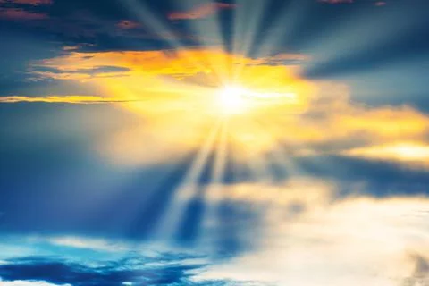 Sunset sky with dramatic clouds Stock Photos