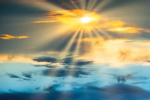 Sunset sky with dramatic clouds Sunset sky with dramatic clouds and sun sh... Stock Photos