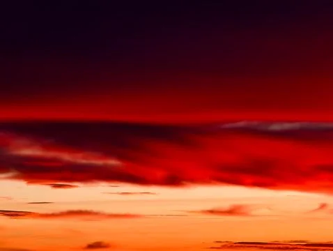 Sunset Sky with Dramatic Red Clouds Dark Horizon Abstract Gradient Background Stock Photos