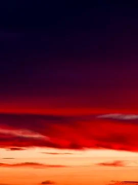 Sunset Sky with Dramatic Red Clouds and Horizon Abstract Orange Gradient Stock Photos