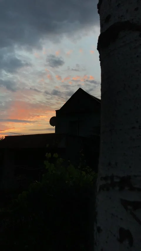 Sunset sky in the evening in the village Stock Footage 241180260