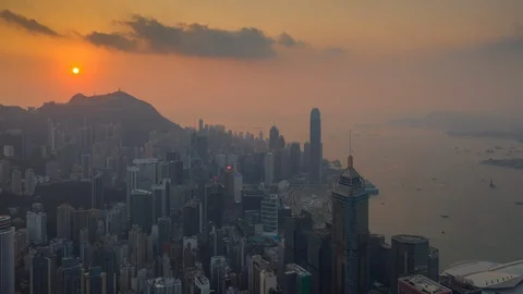 Sunset sky flight over hong kong city bay aerial panorama 4k timelapse Stock Footage 112803419