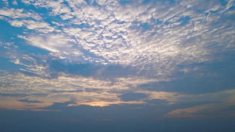 Sunset Sky with Glowing Clouds and Soft Evening Light Stock Footage 342235950