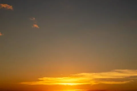 Sunset Sky with Golden Clouds Stock Photos