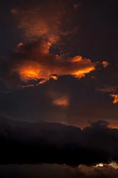 Sunset sky illuminated by orange clouds. Only sky, no earth. Foto stock
