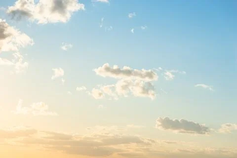 Sunset sky, light pale sunset sky Stock Photos