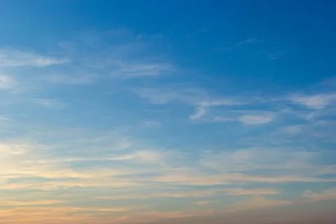 Sunset sky with multicolor clouds. Dramatic twilight sky background Stock Photos