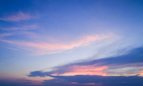 Sunset sky with multicolor clouds Stock Photos