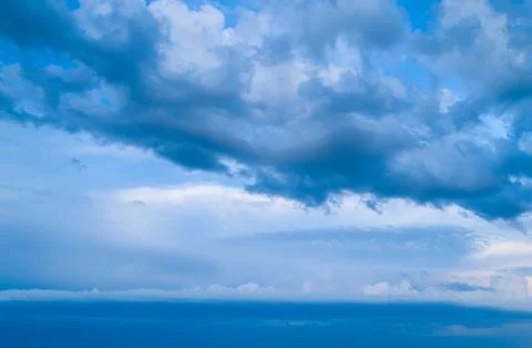 Sunset sky with multicolor clouds Stock Photos