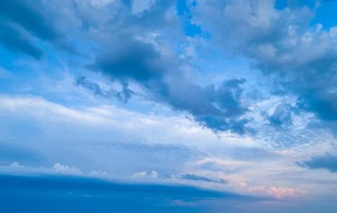 Sunset sky with multicolor clouds Stock Photos