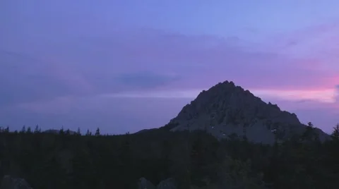 Sunset sky over the forest mountains Stock Footage 53809916