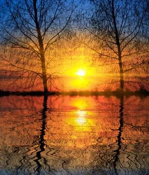 Sunset sky over lake Stock Photos