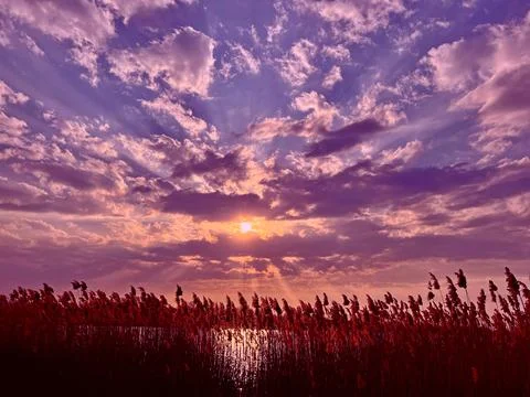 Sunset sky over lake Stock-Fotos