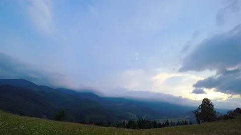 Sunset Sky over the Mountains. Stockbeeldmateriaal 70928154
