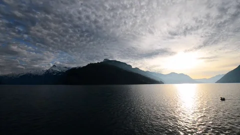 Sunset sky over the mountains. Landscape in the Alpine lake. Stock Footage 73590667