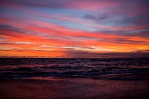 Sunset sky over the ocean Stock Photos