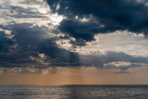 Sunset sky over ocean Stock Photos