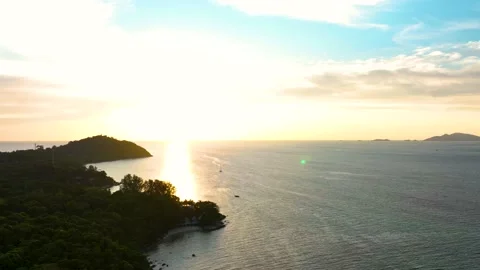 Sunset sky over ocean sea as water wave island Stock Footage 231961453