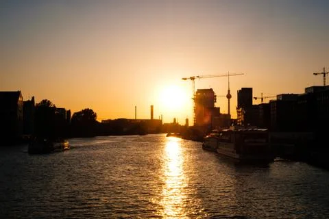 Sunset sky over river spree in Berlin with Tv tower skyline - Stock Photos