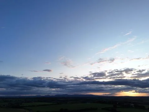 Sunset Sky Over Rural Fields in Aerial Landscape 스톡 사진