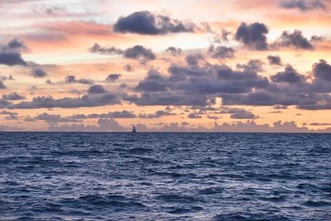 Sunset sky over the sea, beautiful cloudscape, dramatic landscape, seascape Stock Photos