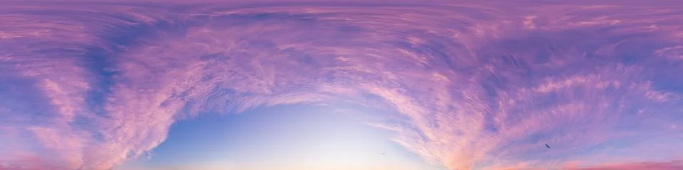 Sunset sky panorama with dramatic bright glowing pink Cirrus clouds. HDR 360 Stock Photos