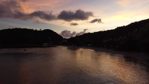 Sunset sky reflected in the sea, view from a drone Stock Footage 166780725