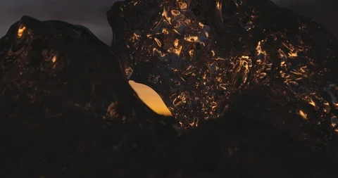 Sunset sky seen through two smooth ice chunks 스톡 동영상 103810787