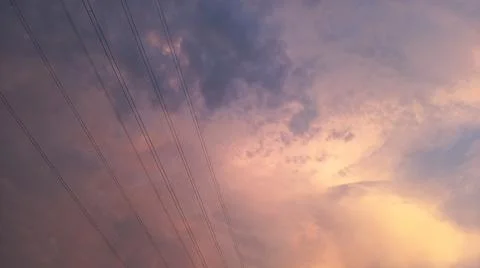 Sunset sky with silhouette trees and electricity transmission tower Stock-Fotos