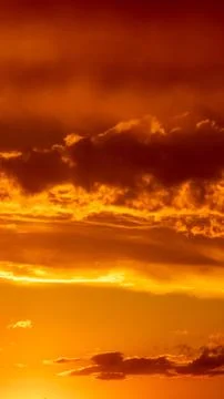 Sunset sky with stunning clouds in the background. vertical banner, story.. Stock Photos