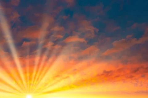 Sunset sky, sun with sun rays beams Stock Photos