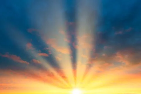 Sunset sky, sun with sun rays beams Stock Photos