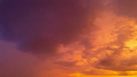 Sunset Sky timelapse. Moving clouds and sunset. Clouds float through the evening Stock Footage 302762049