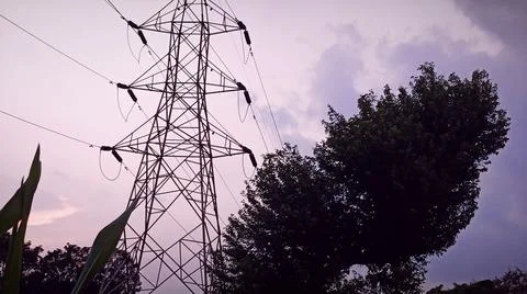 Sunset Sky with Tree Silhouette and Electric Tower Background Stock-Fotos