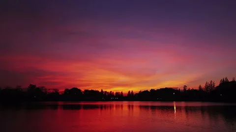 Sunset sky, twilight red sky with reflection on water Stock Footage 63488781