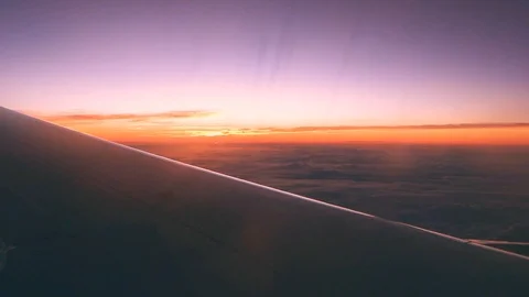Sunset sky view through airplane window, Beautiful sunset Видео 89653939