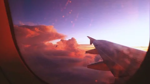 Sunset sky view through airplane window, Beautiful sunset Stock Footage 89653940