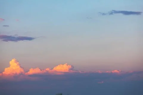 Sunset sky with voluminous clouds Stock Photos