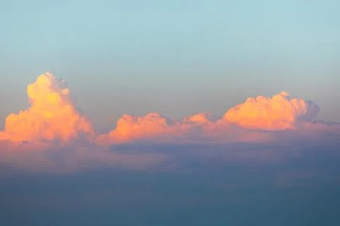 Sunset sky with voluminous clouds Stock Photos