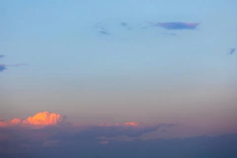 Sunset sky with voluminous clouds Stock Photos