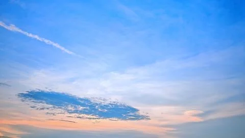 Sunset Sky with Warm Gradient and Clouds 写真素材