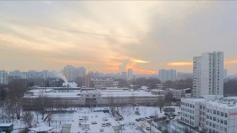 Sunset on the sky in winter city timelapse Stock Footage 81607095