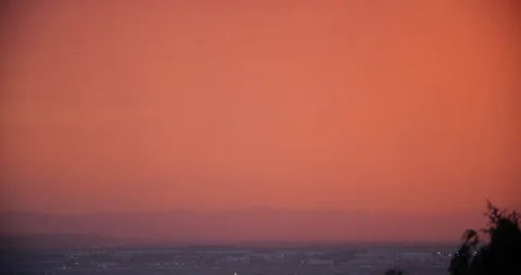 Sunset SLC pan to smokestack Stock Footage 104111165