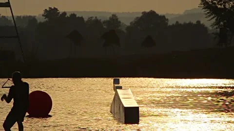 Sunset Slider Slowmotion Wakeboarding HD Stock Footage 48440862