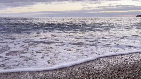 Sunset slow motion shot of a wave in Cassis, France Stock Footage 231169463
