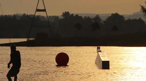 Sunset Slowmotion Wakeboarding HD Stock Footage 48440889
